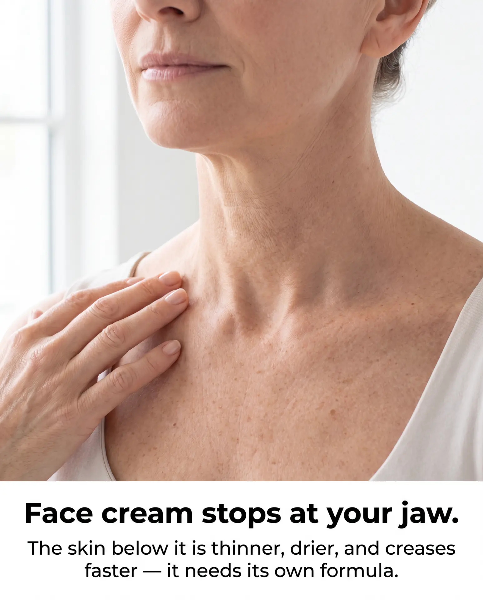 Close-up of a woman's neck and chest showing fine crepey lines